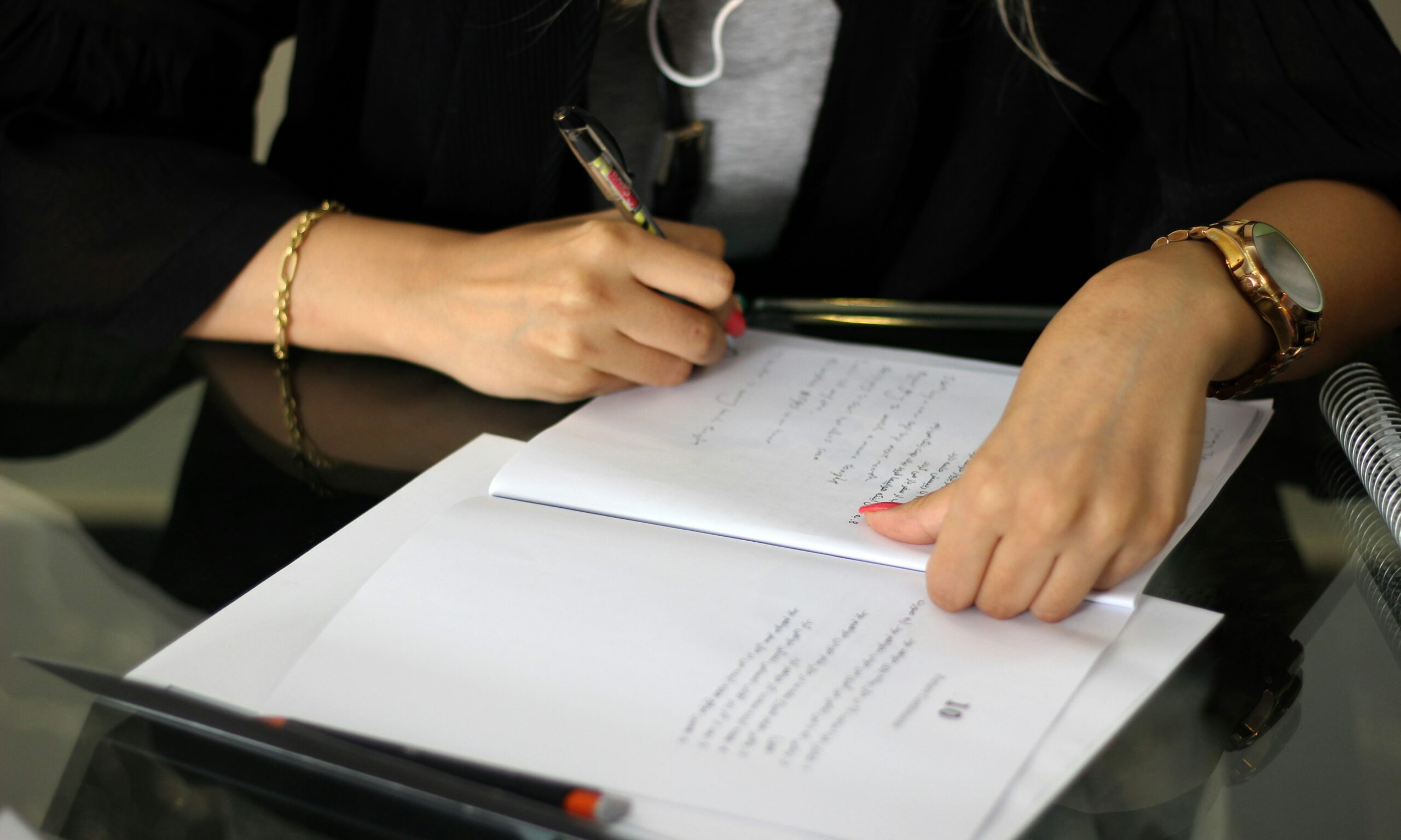 Homeowner reviewing documents at kitchen table