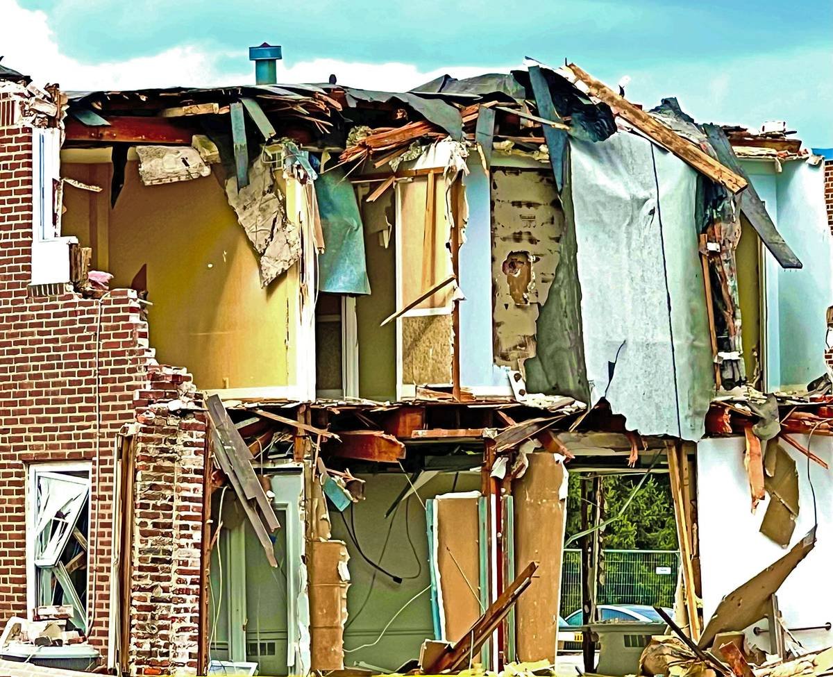 a building that has been torn down and is being demolished